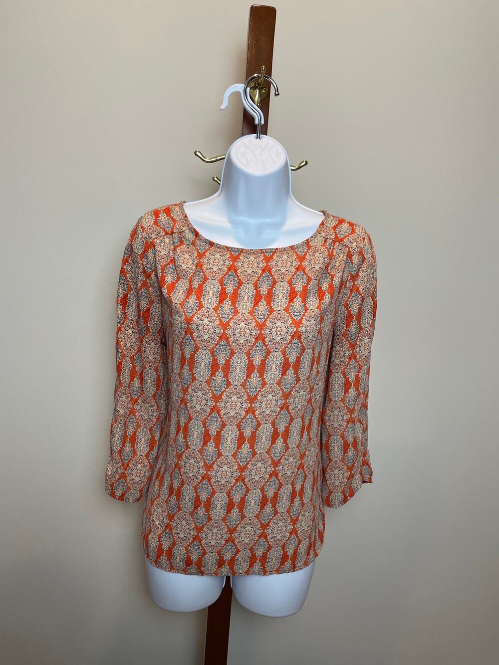 The Limited Size M Orange Long Sleeve Top with Cream Boho Print, High‑Low Hem